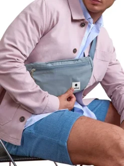 Banane bleue unie avec une fermeture zippée et une sangle réglable