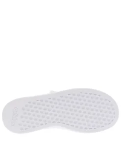 Baskets blanches avec semelle à talon plat et à fermeture velcro