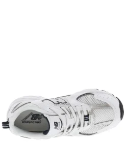 Baskets multisport 530 blanches avec multiples logos de la marques