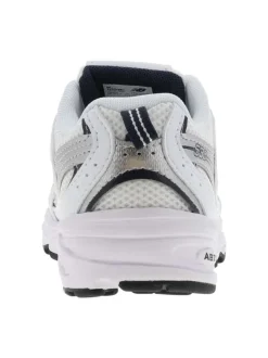 Baskets multisport 530 blanches avec multiples logos de la marques