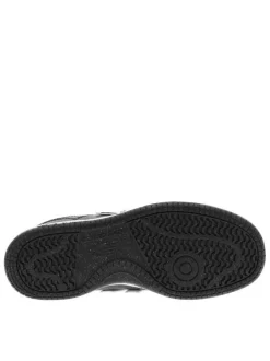 Baskets skate en cuir noires avec semelle à talon plat et empiècements chromés