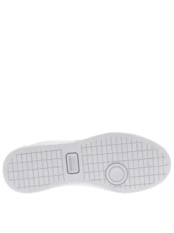 Baskets tennis blanches à talon plat avec logo vert brodé et lacets plats