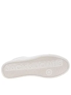 Baskets basses en cuir blanc à semelle plate vulcanisée et lacets ronds tressés