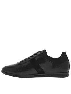 Baskets basses en cuir noir à semelle sneakers à talon plat et à lacets enduis