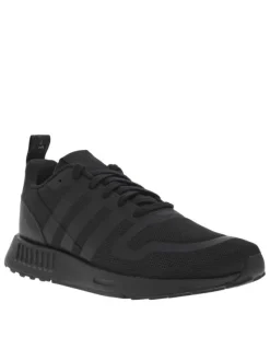 Baskets basses en Mesh textile monochromme à bandes noires et lacets plats