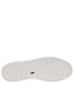 Baskets basses multisport aspect cuir blanc à doublure rouge et lacets plats