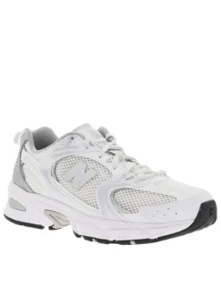 Baskets basses multisport 530 blanches et argentées en mesh avec lacets plats