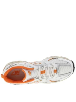 Baskets basses multisport 530 blanches et oranges en mesh avec lacets