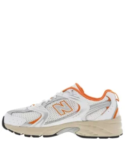 Baskets basses multisport 530 blanches et oranges en mesh avec lacets