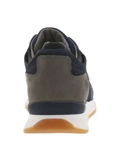 Baskets basses running en cuir bleu marine avec des lacets blancs et noirs