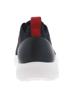 Baskets basses Slip-on en textile stretch texturé noir uni avec une semelle respirante et détails rouges
