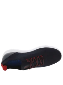 Baskets basses Slip-on en textile stretch texturé noir uni avec une semelle respirante et détails rouges