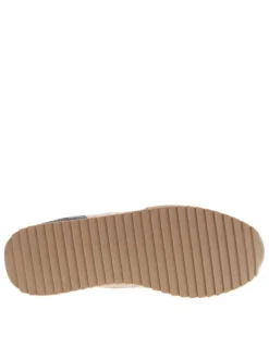 Baskets basses style running beige avec des lacets plats et détail tricolore