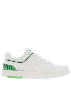 Baskets basses tennis blanches à lacets plats avec détails verts et marine