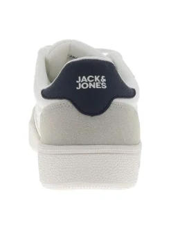 Baskets blanches à talon plat avec des lacets et logo brodé sur le côté