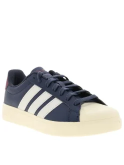 Baskets bleues avec un talon plat pourvu de lacets et de bandes blanches