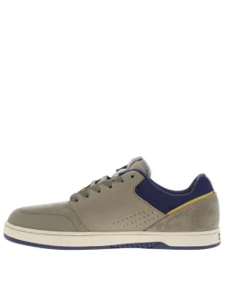 Baskets kaki en cuir à talon plat avec des lacets et un logo blanc