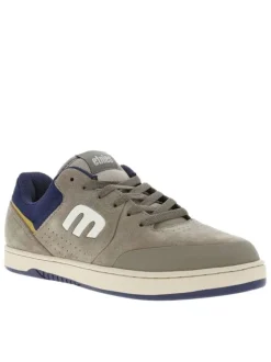 Baskets kaki en cuir à talon plat avec des lacets et un logo blanc