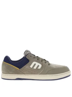 Baskets kaki en cuir à talon plat avec des lacets et un logo blanc