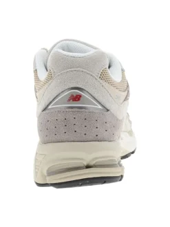 Baskets multisport 2002 beige à talon plat avec du mesh sur le pourtour