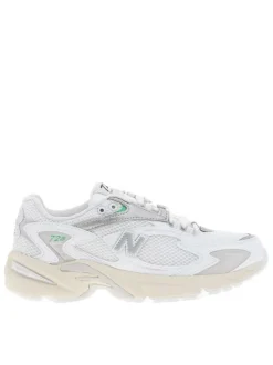 Baskets multisport blanches à talon plat en mesh sur le pourtour