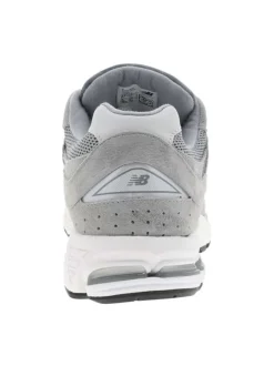 Baskets multisport 2002 grises à talon plat avec du mesh sur le pourtour