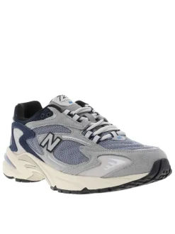 Baskets multisport grises à talon plat et à lacets ronds blancs