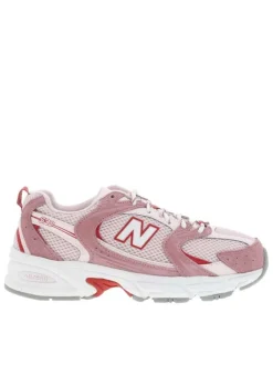 Baskets multisport 530 roses avec un talon plat et des lacets ronds bicolores