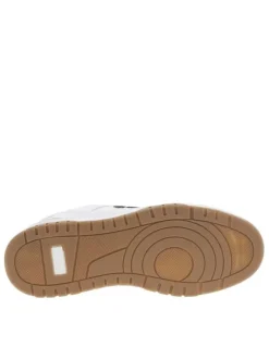 Baskets multisports blanches et noires à semelle plate et à lacets plats rayés