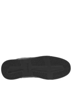 Baskets noires à talon plat avec des lacets noirs et un logo beige