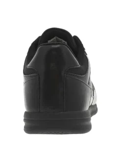 Baskets noires à talon plat avec des lacets noirs et un logo beige