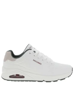Baskets running blanches avec un talon compensé bas et des lacets