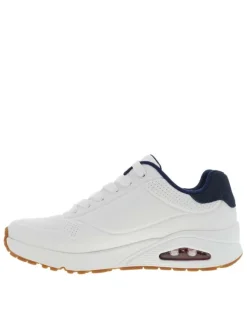 Baskets running blanches avec un talon compensé bas et des lacets