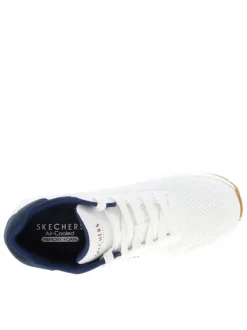 Baskets running blanches avec un talon compensé bas et des lacets