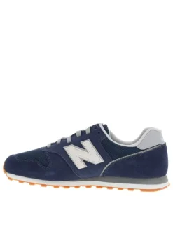 Baskets running 373 bleu marine avec un talon plat et un patch sur la languette