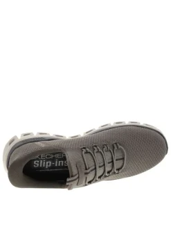 Baskets running brunes avec une semelle plate et une fermeture slip-on