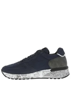 Baskets running en cuir bleu marine à talon compensé bas avec aspect matelassé