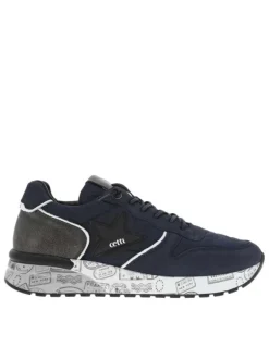 Baskets running en cuir bleu marine à talon compensé bas avec aspect matelassé