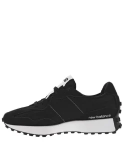 Baskets running en cuir noires et blanches à semelle plate à crans
