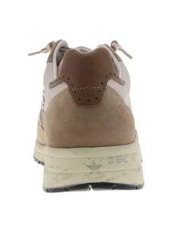 Baskets running en cuir taupe avec des motifs sur la semelle et des lacets ronds