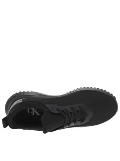 Baskets running noires avec slip-on à la chevillière et des lacets plats