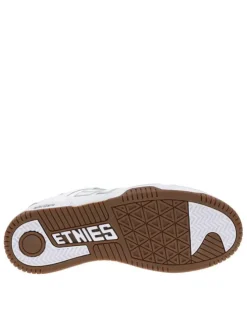 Baskets skate blanches en cuir à semelle marron avec logos verts et lacets plats
