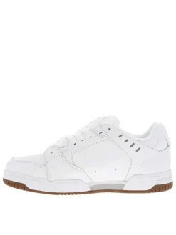 Baskets skate blanches en cuir à semelle marron avec logos verts et lacets plats