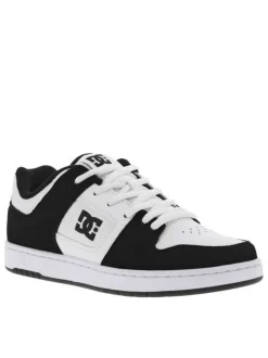 Baskets skate en cuir noires et blanches à talon plat avec des logos noirs