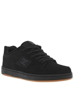 Baskets skate en cuir noires à semelle marron avec des lacets ronds