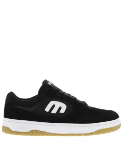 Baskets skate noires avec des talons plat et une languette épaisse