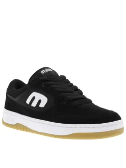 Baskets skate noires avec des talons plat et une languette épaisse