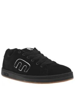 Baskets skate noires en cuir à semelle marron avec logos blancs et lacets noirs