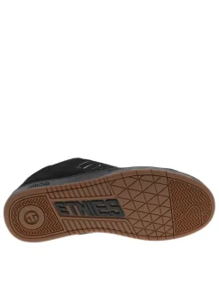 Baskets skate noires en cuir à semelle marron avec logos blancs et lacets noirs