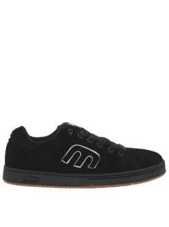 Baskets skate noires en cuir à semelle marron avec logos blancs et lacets noirs
